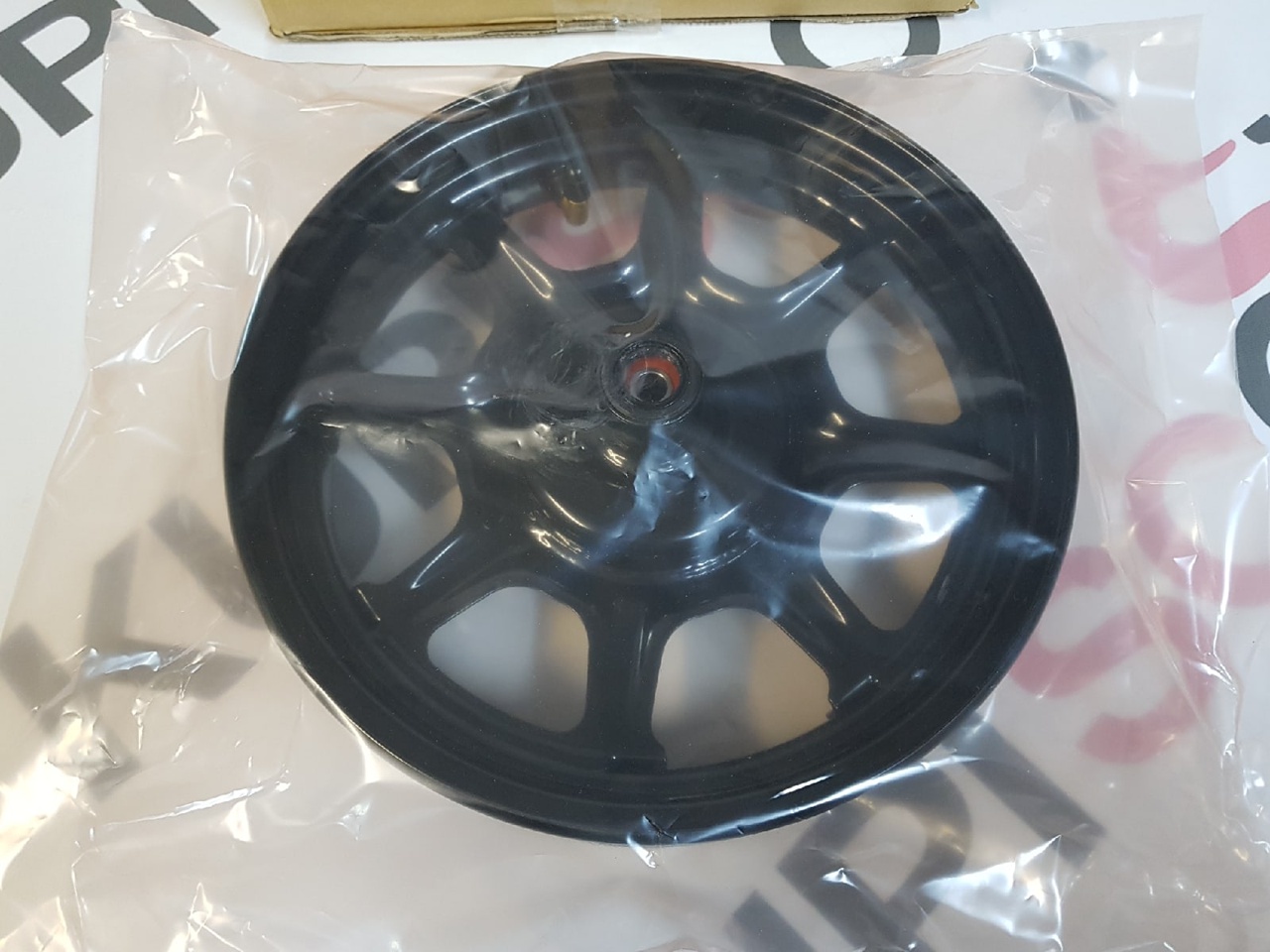 Диск колесный передний (ЧЕРНЫЙ) Honda Tact AF75 / AF79, Giorno AF77, Yamaha Vino AY02, Jog AY01 (44650-GJA-J01ZA) оригинал