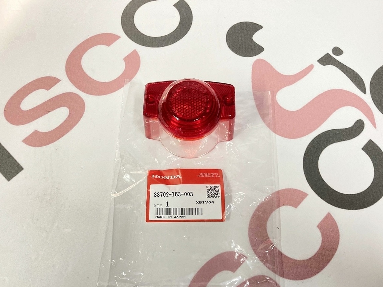 Стекло стоп-сигнала Honda Zoomer AF58 / Joker 50/90 (33702-163-003) оригинал