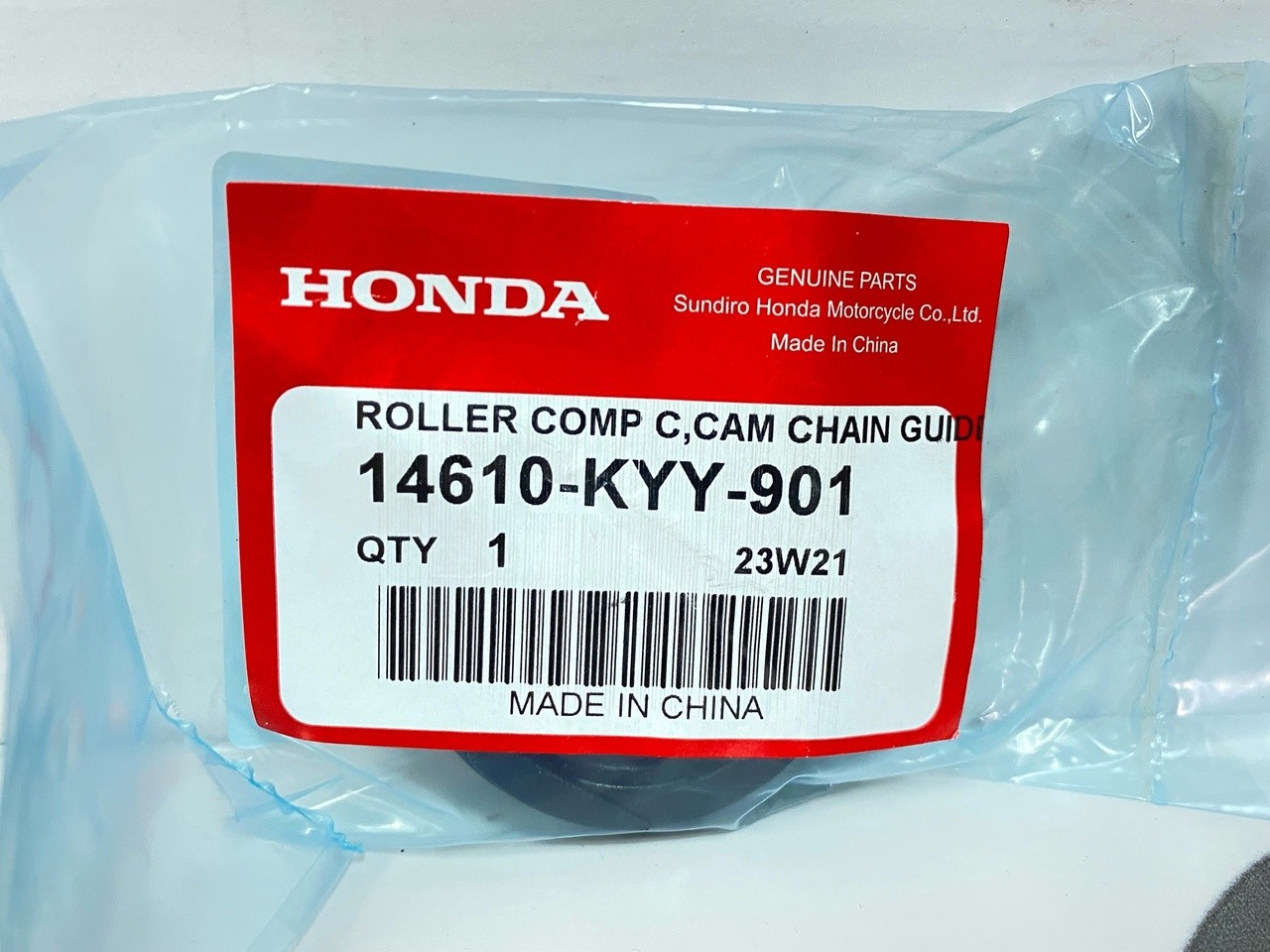 Ролик натяжителя цепи ГРМ Honda Super Cub AA04, CRF 50 / 110 / 125, MSX 125 (14610-KYY-901) оригинал