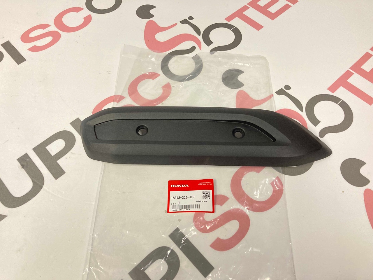 Накладка на глушитель Honda Tact  AF75 , AF79 / Dunk AF74 / Yamaha Jog AY01 (18318-GGZ-J00 и B3K-14718-00) оригинал