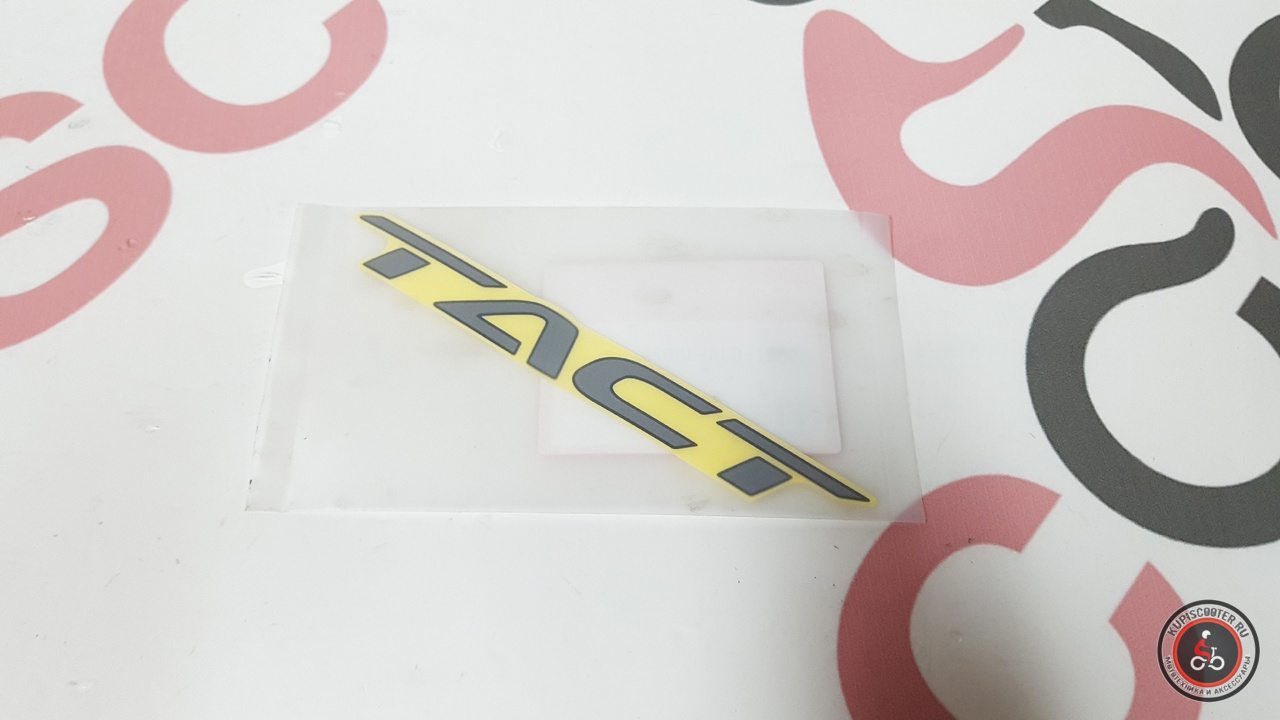 Наклейка на боковой обтекатель Honda Tact AF75 / AF79 (86831-GJA-J00ZA) Оригинал